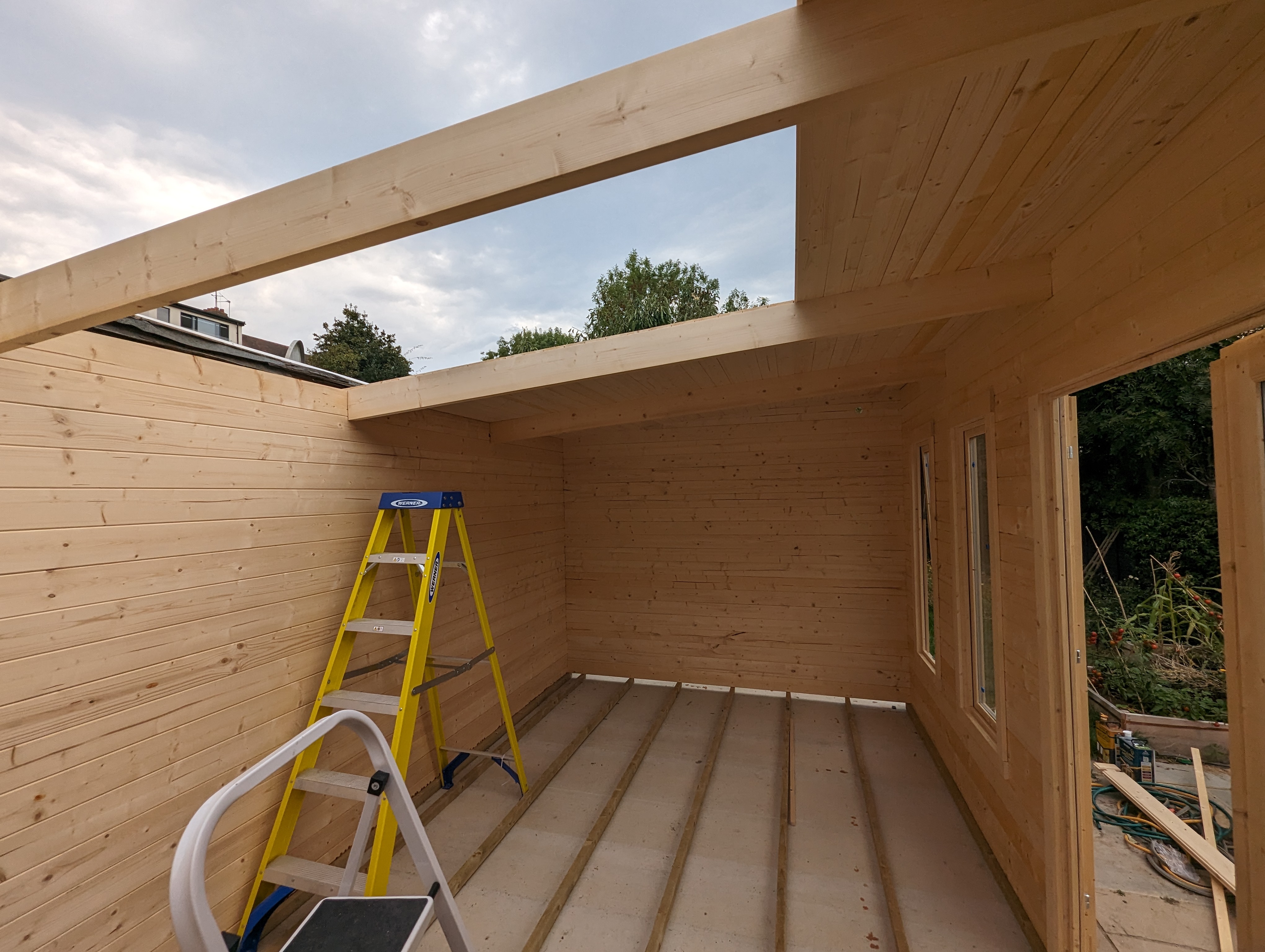 Nailing the roof boards.