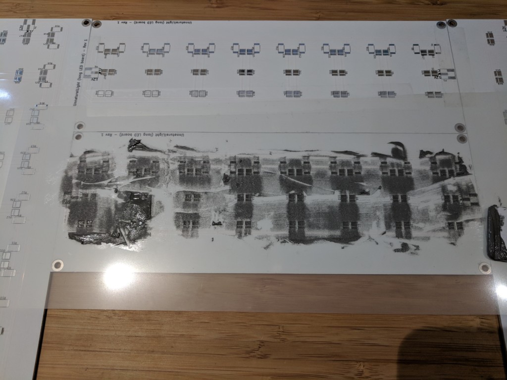 Paste printing using a laser-cut mylar stencil.