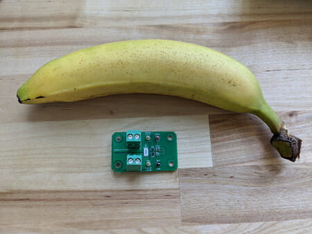 Connectors and test terminal posts soldered. Banana for scale.